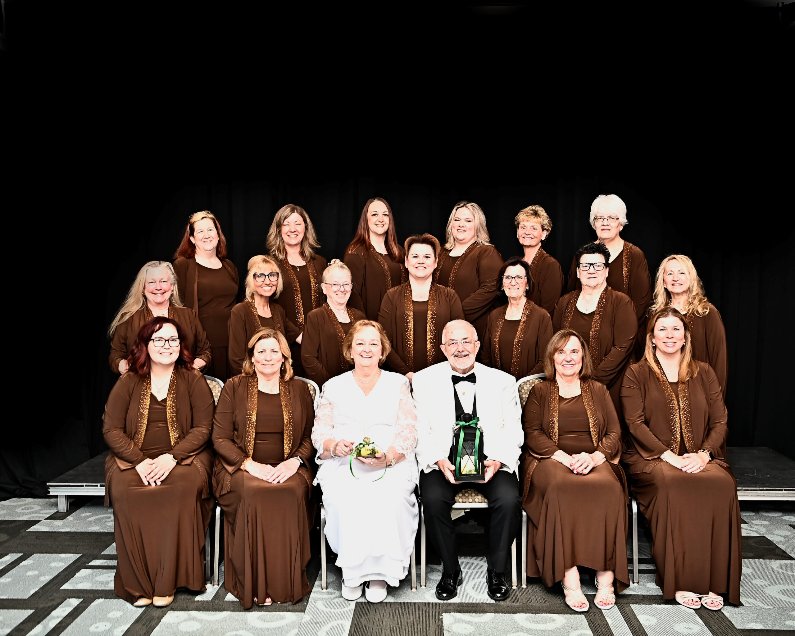 image003 Group dressed in brown with Grand Matron and Patron dressed in white